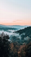 Fototapeta premium Misty Mountain Landscape at Dawn with Soft Gradient Sky Colors