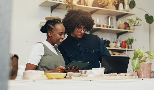 Workshop, people or startup with laptop for pottery, design inspiration or verification for order. Small business, man or woman as ceramist with tablet for clay ecommerce, track inventory or teamwork - Powered by Adobe