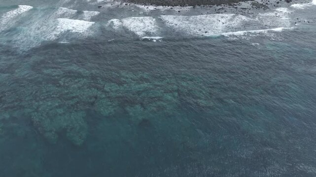 Comoros, Grande Comore, Foumbouni, ilot la Tcheka, small fishing harbor forward revealing