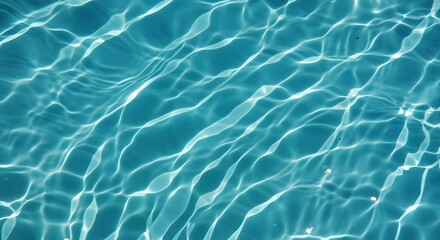 Obraz premium Sunlight Reflecting on Clear Blue Water Creating Ripples and Patterns