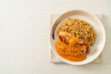 grilled chicken steak with red curry sauce and rice