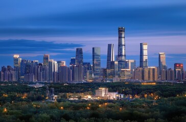 Obraz premium Spectacular Evening Skyline of Beijing with Tall Skyscrapers Under a Dramatic Blue Sky