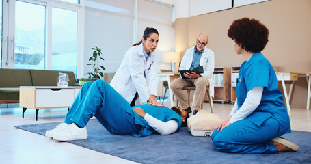 Nurse, cpr or people training with doctor for first aid practice, cardiac arrest or safety...