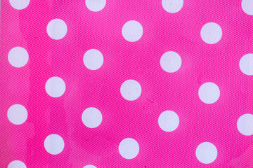 Vibrant Pink Polka Dot Fabric Background