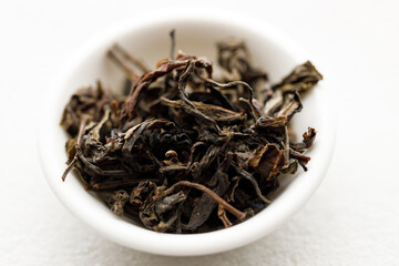 Japanese or Chinese tea leaf on white background.