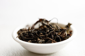 Japanese or Chinese tea leaf on white background.