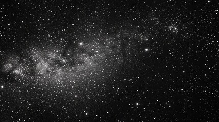 Fototapeta premium Breathtaking View of a Starry Night Sky with a Glimpse of the Milky Way
