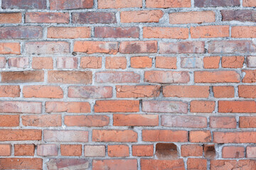 Fototapeta premium Old weathered brick wall as background .