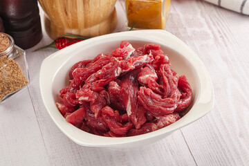 Raw beef meat - sliced strips