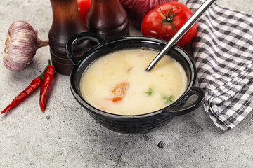 Salmon cream soup with vegetables