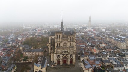 Aerial View of Amiens Cathedral with Foggy Urban Landscape in Northern France