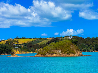 View of the blue tropic ocean from a ferry on the Island of Waiheke in Auckland, New Zealand.