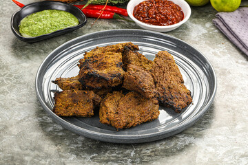 Grilled beef barbecue with spises