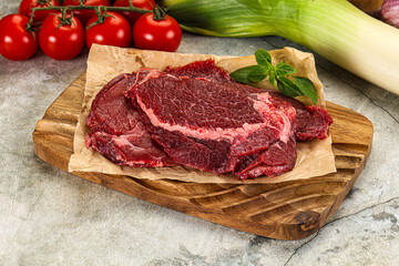 Raw beef cheeks cut for cooking