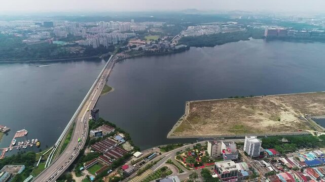 Aerial Birds Eye view of Singapore and Johor Straits from Malaysia