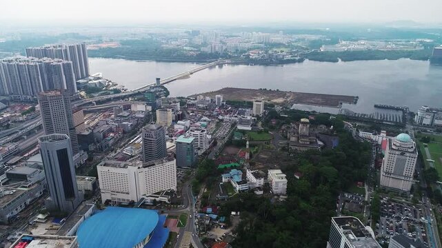 birds eye view aerial dolly in shot of Johor Bahru cityscape