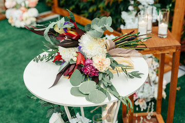 Elegant bridal bouquet with colorful flowers and greenery