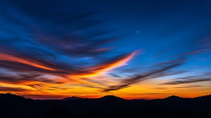 Fototapeta premium Crescent Moon in a Twilight Sky with Gradient Colors and Wispy Clouds