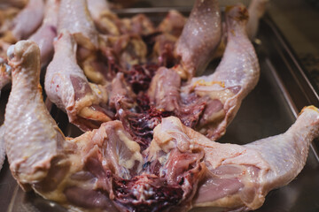 Piece of chicken close-up at the butcher's.