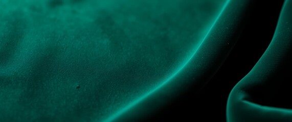A close-up photograph of a stylish textile background, a luxurious velvet fabric in deep emerald green, showing the rich texture and subtle sheen of the material, with  soft lig.