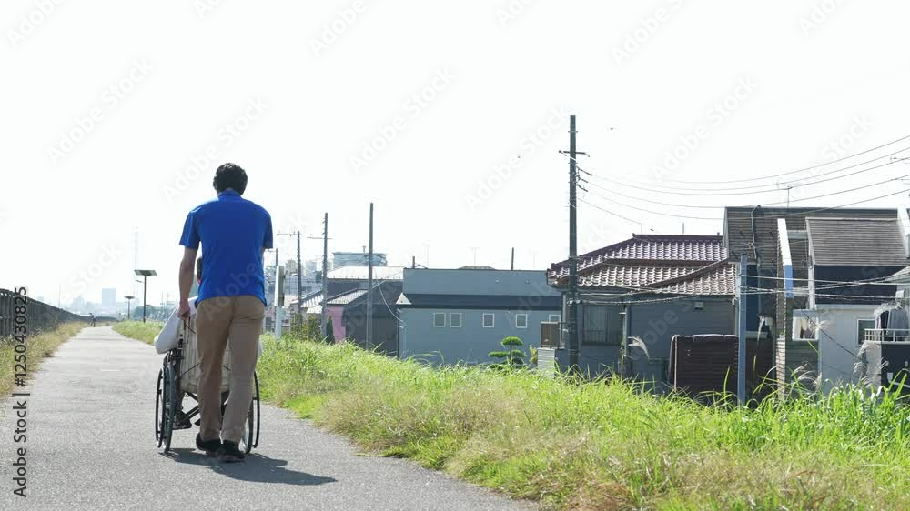 Aufkleber 介護、車椅子、散歩、介護士、ヘルパー、後ろ姿、外出、屋外、歩道、サポート、デイサービス、シニア、高齢者、お年寄り、老人ホーム、施設、デイケア、レク、住宅街、公園、道、自然、青空、コピースペース、背中、福祉、ウェルネス、障害、障がい者、ボランティア、女性、男性、日本人、サービス、支援、フレイル、サルコペニア、哀愁、高齢化社会、老後、終活、ホームヘルパー、風景、広角、看護、見守り、介護福祉士、遠近感、
