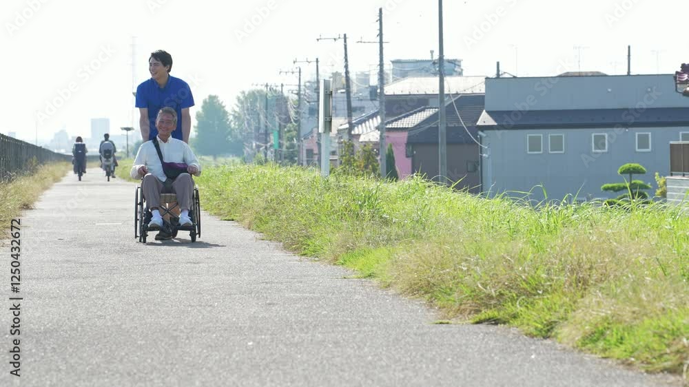 Leinwandbilder 介護、車椅子、シニア、散歩、介護士、外出、ヘルパー、高齢者、お年寄り、街、笑顔、都市、社会、ウェルネス、福祉、ケアスタッフ、スタッフ、介助、老後、介護福祉士、歩道、バリアフリー、障害者、障害、ホームヘルパー、屋外、サービス、サポート、訪問、介護員、自立支援、リハビリ、健康、ヘルスケア、老人ホーム、付き添い、施設、青空、ポジティブ、元気、明るい、リラックス、男性、デイサービス、日本人、歩く、会話、河