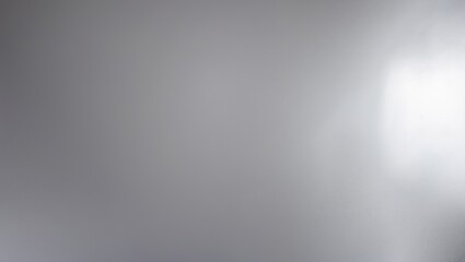 Obraz premium Minimalist silver surface with soft gradients and a subtle reflective quality showcasing modern design and industrial elegance.