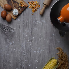 Baking wooden background with organic ingredients on the table, copy space - Square