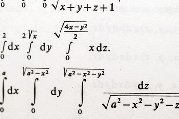 Mathematical Formulas and Equations in Textbooks Featuring Integrals, Square Roots, and Parametric Functions