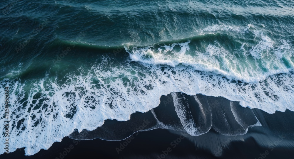 Aufkleber aerial view of turquoise waves breaking on a black sand beach creating patterns and textures on the 