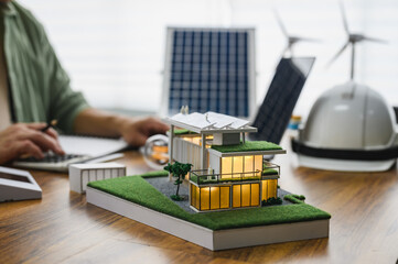 Modern eco-friendly house model with green roofs, Solar panels roof installation design with Energy...