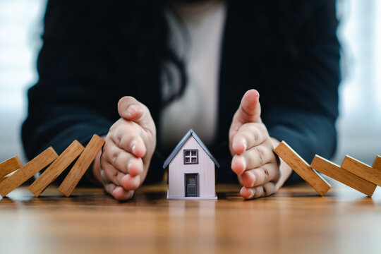 Woman protects a miniature house from falling dominoes, Risk management, home insurance, and financial security, Personal Property Coverage
