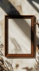 Sunlit Frame Mockup: A rustic wooden frame with a blank canvas, bathed in warm sunlight casting soft, organic shadows. Perfect for showcasing your artwork, typography, or product designs. 