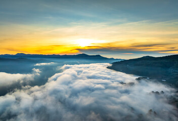 Aerial view of the town mist in the sunrise sky is beautiful in the highlands of Da Lat, Vietnam