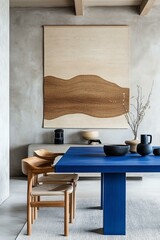 Modern Dining Room with Blue Table and Beige Artwork