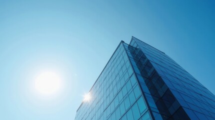 A sleek modern office building with a glass facade reflecting the sky, sharp lines and a professional look, captured on a bright sunny day