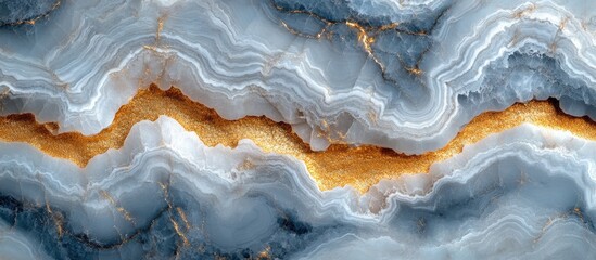 Obraz premium Blue and gold marble texture background with layered patterns suitable for design or decorative purposes.