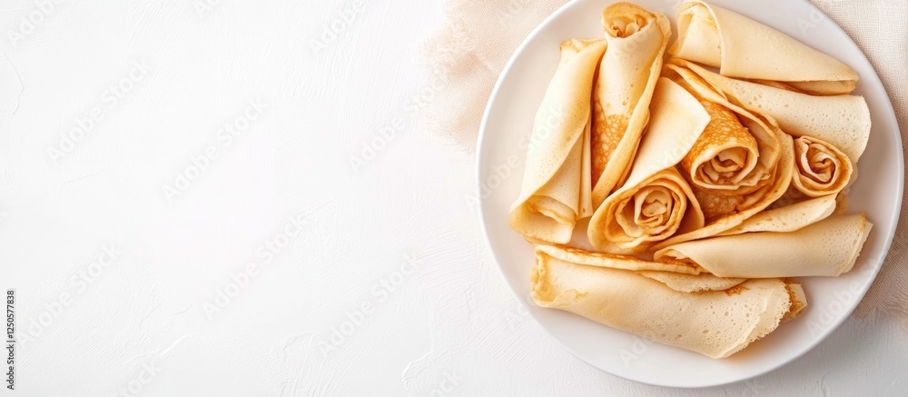 Aufkleber mini pancakes filled with sweet shepherd filling arranged on a plate with white background and ample