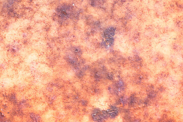 Corroded metal background. Rusted grey painted metal wall. Rusty metal background with streaks of rust. Rust stains. The metal surface rusted spots.