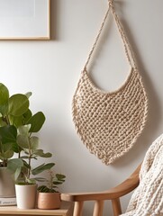 Fototapeta premium Minimalist Boho Decor Handwoven Macrame Plant Holder with Ceramic Pots in Cozy Interior - Sustainable Home Styling for Eco-Conscious Consumers
