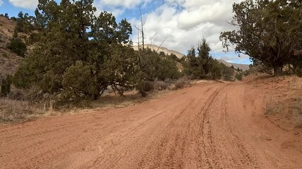  Recreation river off road canyon southern Utah POV.  Off road trail riding in 4x4 all terrain vehicle for sport recreation. Southwest Utah Virgin River canyon gorge. Rocky terrain, mountain cliff.