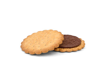 Sandwich cookie with chocolate cream and hazelnuts isolated on white background.