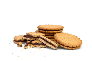Sandwich cookie with chocolate cream and hazelnuts isolated on white background.
