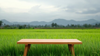 Scenic display montage of lush rice paddies with a rustic empty wooden table for a tranquil atmosphere.