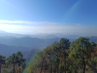 Naklejka premium mountain, landscape, sky, mountains, nature, forest, clouds, cloud, fog, panorama, hill, sunset, tree, travel, valley, green, view, trees, sea, summer, ocean, sun, beauty, morning, grass