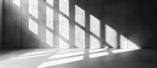 Gray concrete wall texture with shadows creating a dramatic backdrop for design and artistic presentations