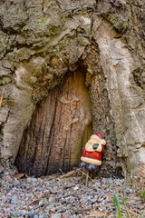 tiny santa by the tree hollow