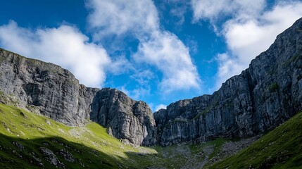 Obraz premium Breathtaking panoramic view of towering cliffs and blue sky in a scenic mountain landscape : Generative AI