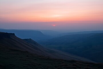 Mountain sunset valley landscape panorama, hazy dusk