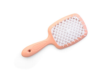 Pink hair plastic comb isolated on white background.